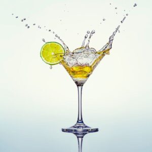 Image of martini glass with lemon wedge and giant splash ppma private physicians medical associates