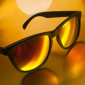Artistic image of sunglasses that provide 100% UVA and UVB protection. Nutrition for Eye Health. PPMA Private Physicians Medical Associates Concierge Medicine, Newport Beach, California