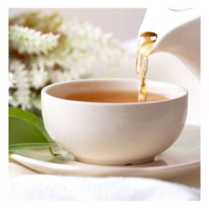 Image shows white tea being poured from white teapot into white teacup which sits atop a white saucer. PPMA. private physicians medical associates