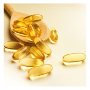 Image shows a wooden spoon with yellow translucent oblong vitamins. vitamin b12. PPMA. private physicians medical associates