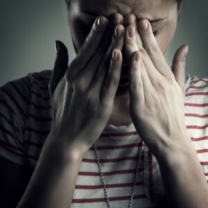 Image of woman rubbing her eyes headache, allergies, itchy eyes. PPMA. Private Physicians Medical Associates