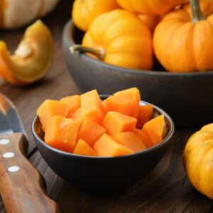 Image of a bowl filled with cut up pumpkin and another bowl of small pumpkins. PPMA. Private Physicians Medical Associates.