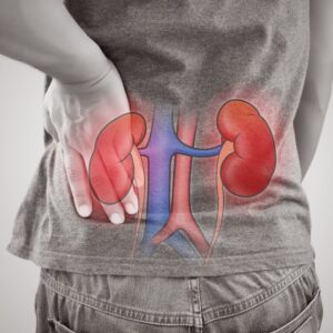 This image shows a person from behind, mid-back down, with their hand on their back-left side - kidney pain.
