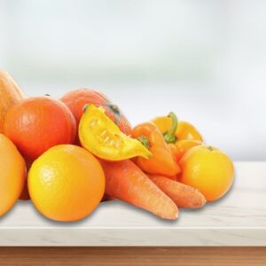 An image of orange fruits and vegetables in honor of Marching Towards Heart Health