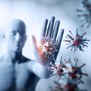 A graphic of a human figure stopping germs and disease with his hand