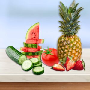 A graphic image of a partially sliced cucumber, watermelon slices stacked upon each other, a tomato, whole and sliced strawberries with an uncut pineapple. On a kitchen counter with blue background.