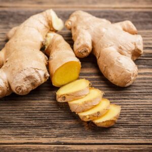 An image of ginger root - whole and sliced