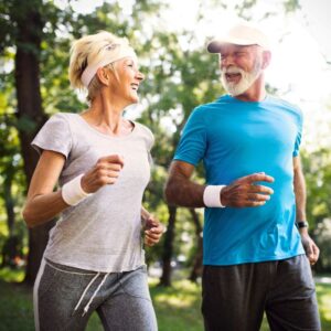 Couple exercising outside. Good habits.